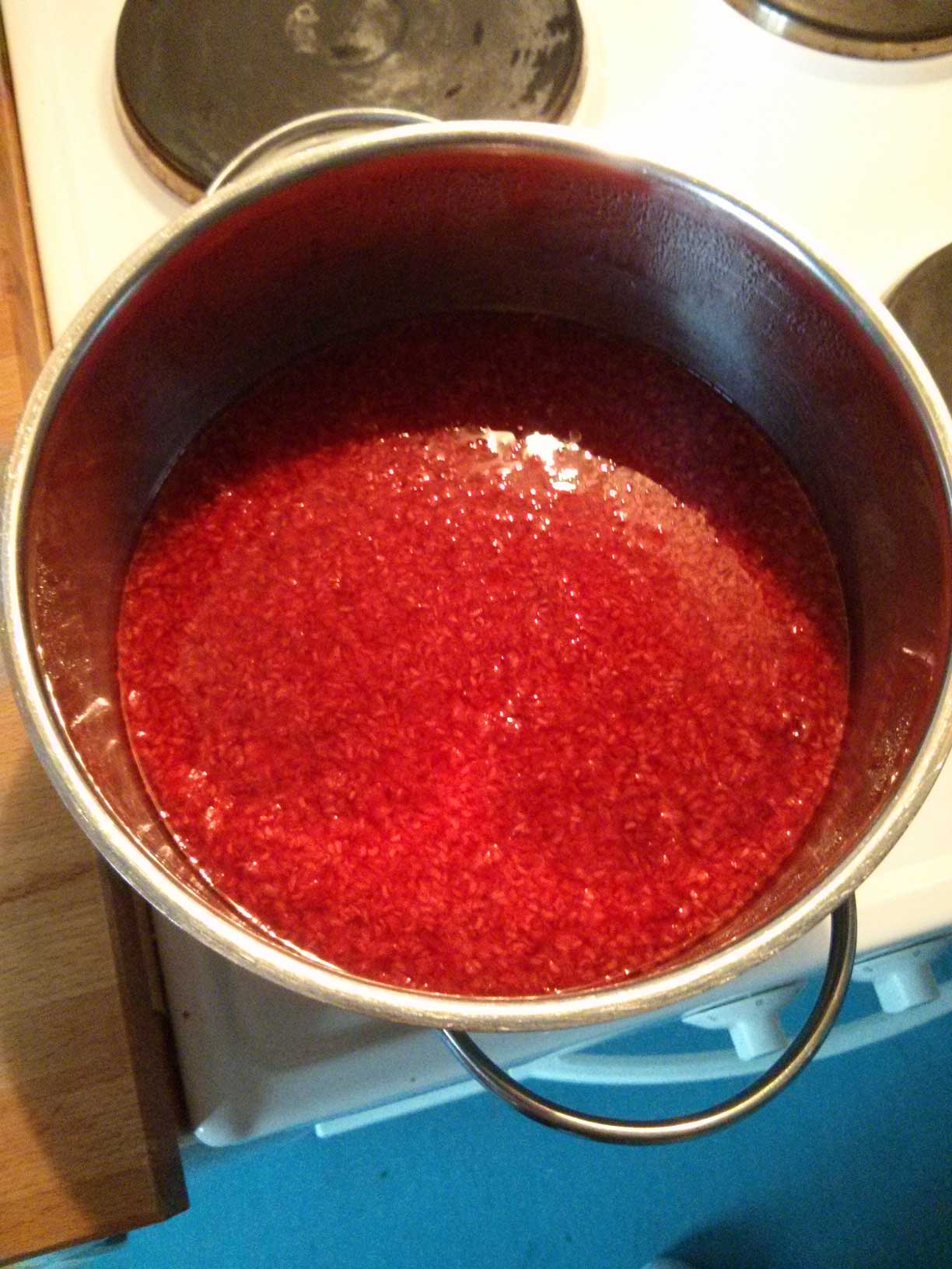 Raspberry Infused Vinegar in the pot doing the infusion magic