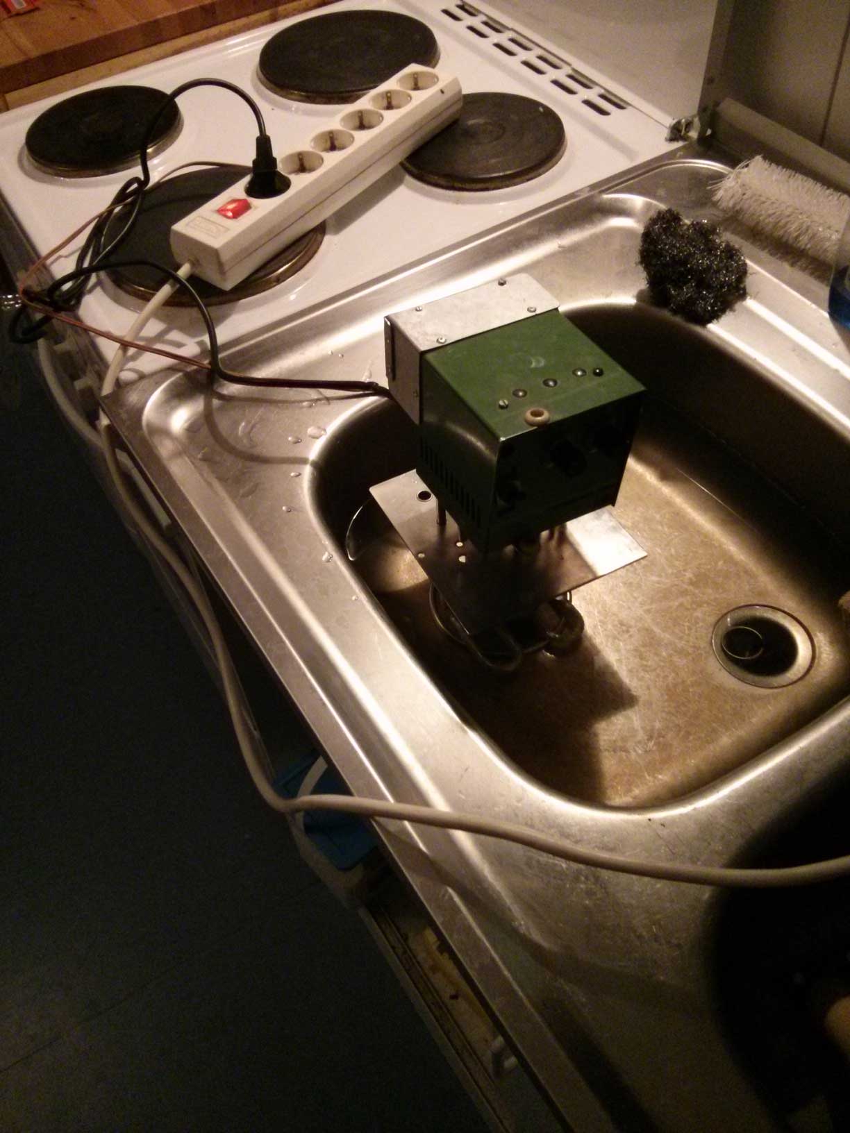 Testing the refurbished Thermomix in the kitchen sink.